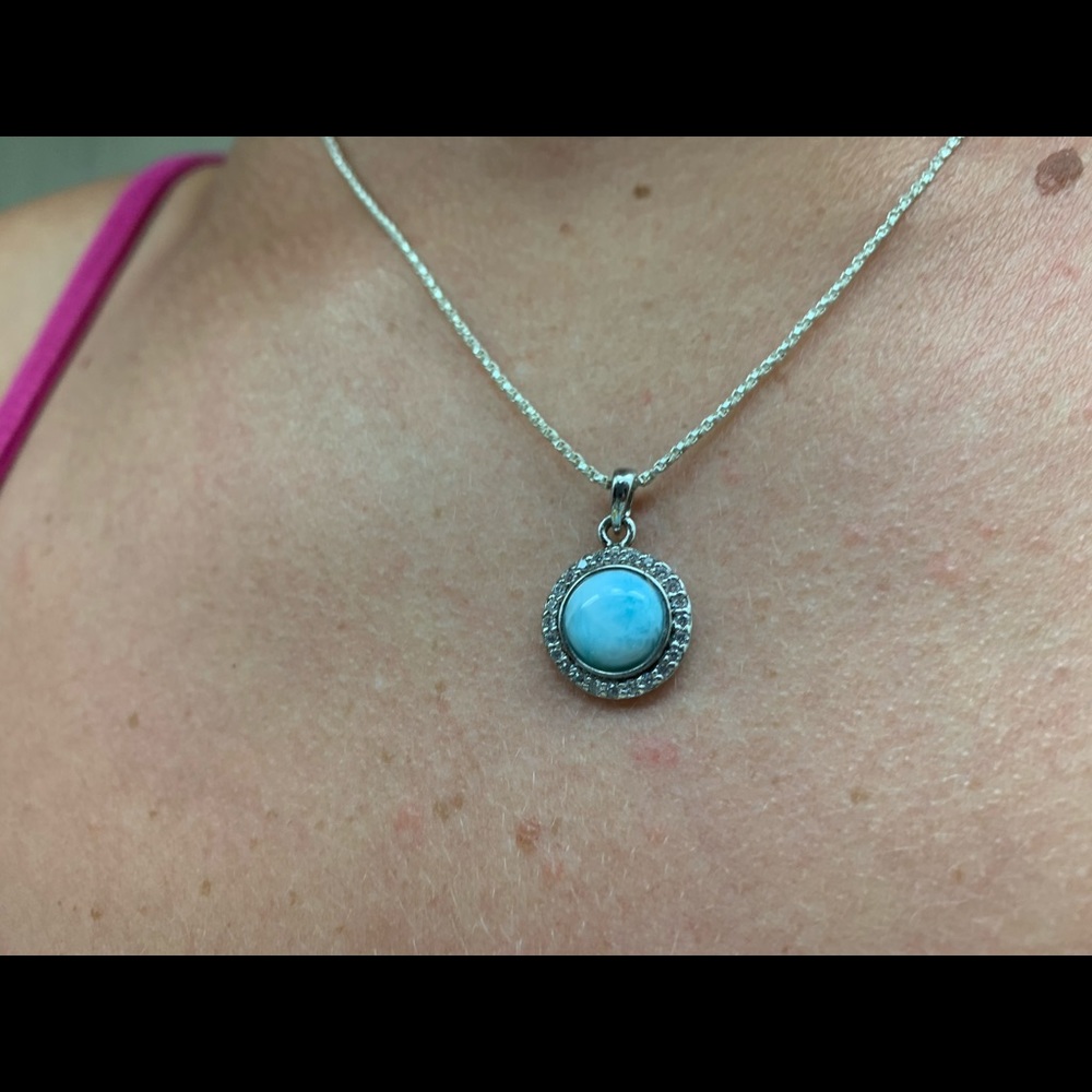 Silver necklace with blue stone/diamond charm